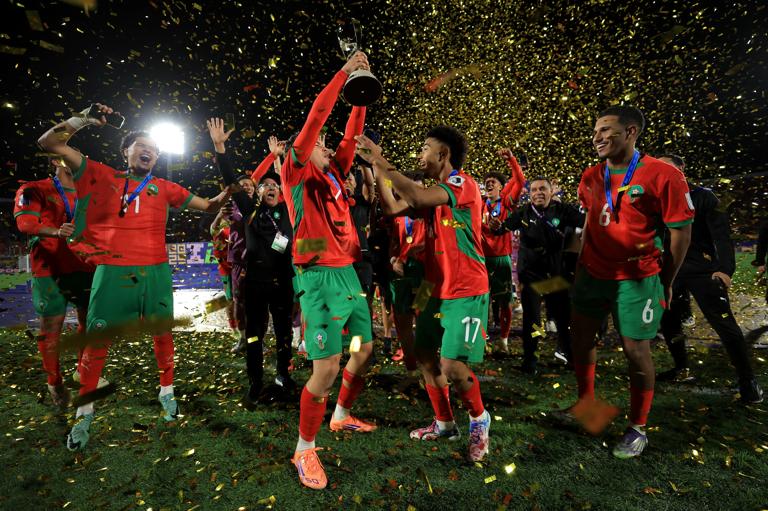 SANTIAGO, CHILE - OCTOBER 19: Othmane Maamma of Morocco  lifts the FIFA U-20 World Cup trophy following his side's victory in the FIFA U-20 World Cup Chile 2025 final match between Argentina and Morocco at Estadio Nacional Julio Mart&iacute;nez Pr&aacute;danos on October 19, 2025 in Santiago, Chile. (Photo by Buda Mendes - FIFA/FIFA via Getty Images)