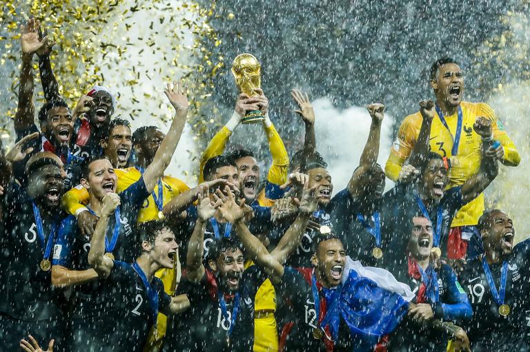 France goalkeeper Hugo Lloris lifts the trophy.
France goalkeeper Hugo Lloris, Benjamin Pavard of France, Presnel Kimpembe of France, Raphael Varane of France, Samuel Umtiti of France, Paul Pogba of France, Antoine Griezmann of France, Thomas Lemar of France, Olivier Giroud of France, Kylian Mbappe of France, Ousmane Dembele of France, Corentin Tolisso of France, Ngolo Kante of France, Blaise Matuidi of France, Steven N Zonzi of France, France goalkeeper Steve Mandanda, Adil Rami of France, Nabil Fekir of France, Djibril Sidibe of France, Florian Thauvin of France, Lucas Hernandez of France, Benjamin Mendy of France, France goalkeeper Alphonse Areola, during the 2018 FIFA World Cup Russia Final match between France and Croatia at the Luzhniki Stadium on July 15, 2018 in Moscow, Russia(Photo by VI Images via Getty Images)