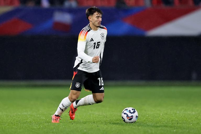 VALENCIENNES, FRANCE - NOVEMBER 19: Jens Castrop of Germany runs with the ball during the friendly match between France U21 and Germany U21 at Stade du Hainaut on November 19, 2024 in Valenciennes, France (Photo by Christof Koepsel/Getty Images)