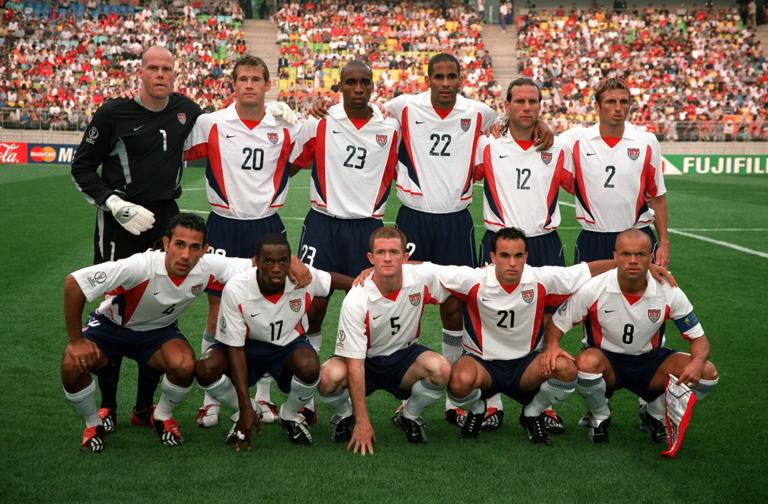 Credit: POPPERFOTO/JOHN MCDERMOTT, Football, 2002 FIFA World Cup Finals, Group D, Suwon, South Korea, 5th June 2002, USA 3 v Portugal 2, The USA team pose together for a group photograph prior to the match, Back Row L-R: Brad Friedel, Brian McBride, Eddie Pope, Tony Sanneh, Jeff Agoos, Frankie Hejduk, Front Row L-R: Pablo Mastroeni, DaMarcus Beasley, John O'Brien, Landon Donovan, and Earnie Stewart  (Photo by Bob Thomas Sports Photography via Getty Images)
